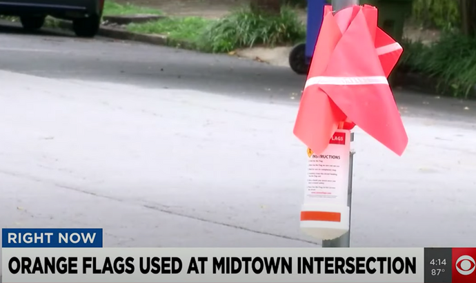 Concerned Citizen Adds Crosswalk Flags to Busy Intersection in Atlanta